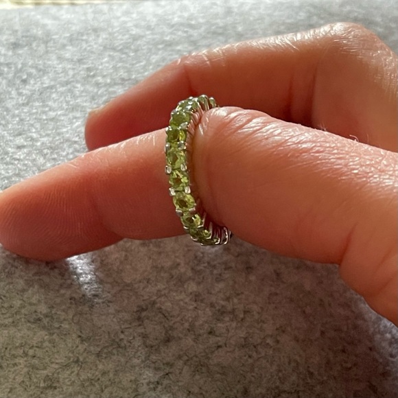 925 Sterling silver eternity ring band, possibly peridot.